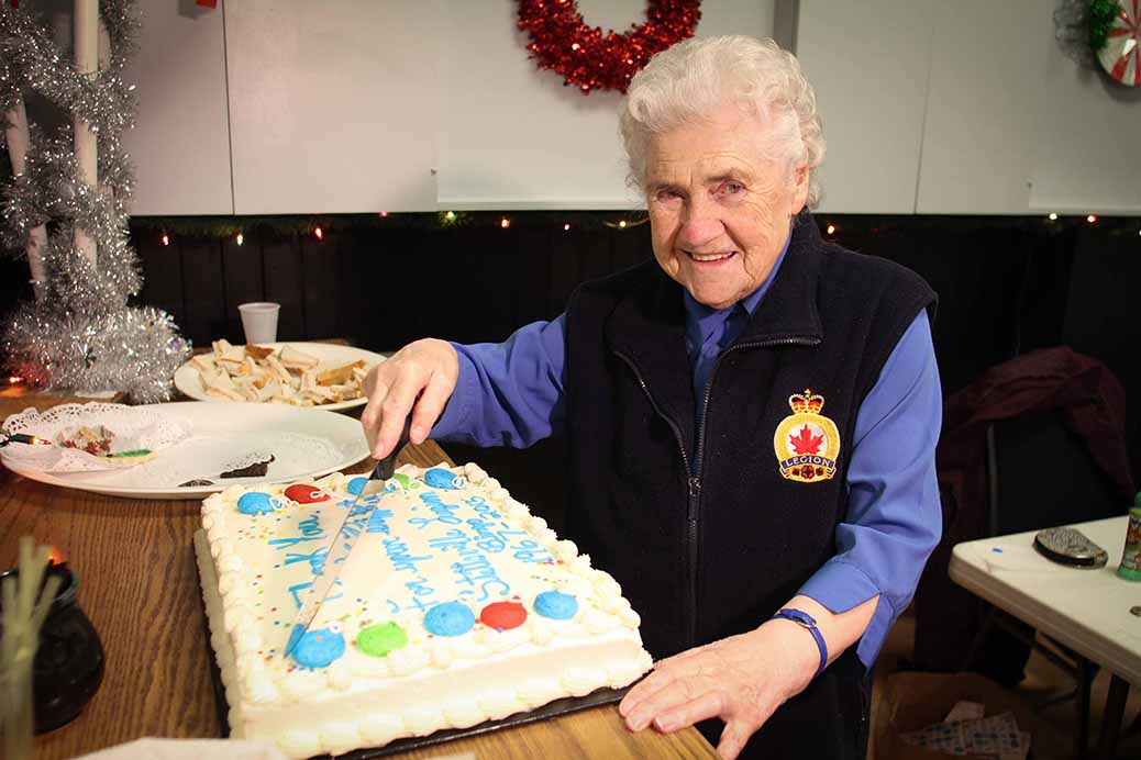 Legion member and bingo regular Christine Forbes cuts a cake to celebrate the 48 years of bingo at the Legion. Christine has been attending for over 40 years. Photo by Barry Gray.