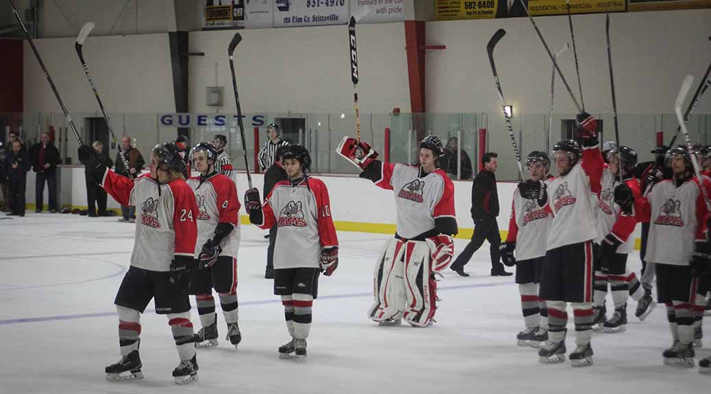 Players salute their fans after the loss.
