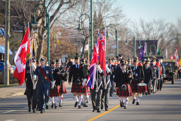 The Colour Party leads veterans and other participants down Stittsville Main Street. Photo by Barry Gray