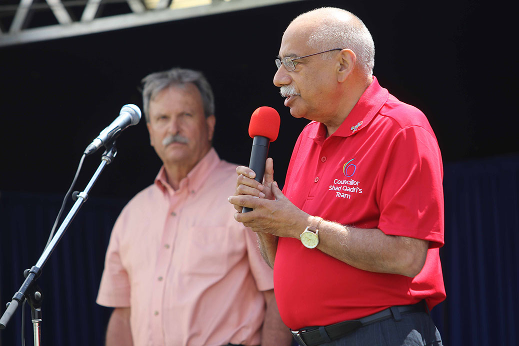 Shad Qadri with MPP Jack Maclaren in the background. Canada 2017 in Stittsville. Photo by Barry Gray.