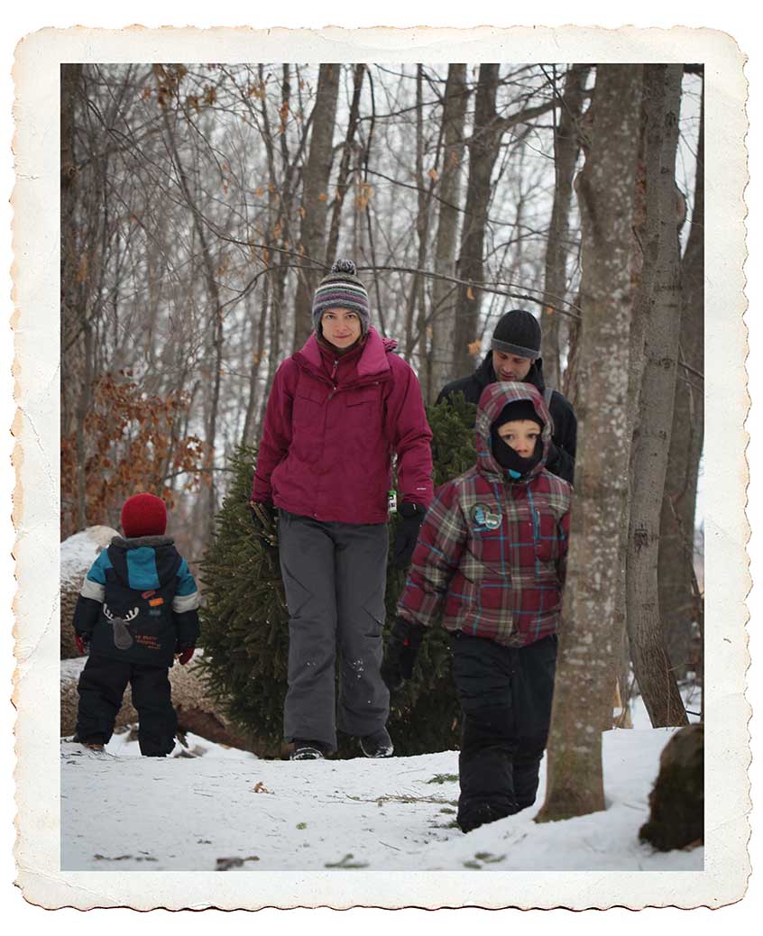 NORTH GOWER, ON. Dec 11, 2016. A family drags back their tree through the woods. Barry Gray (StittsvilleCentral)
