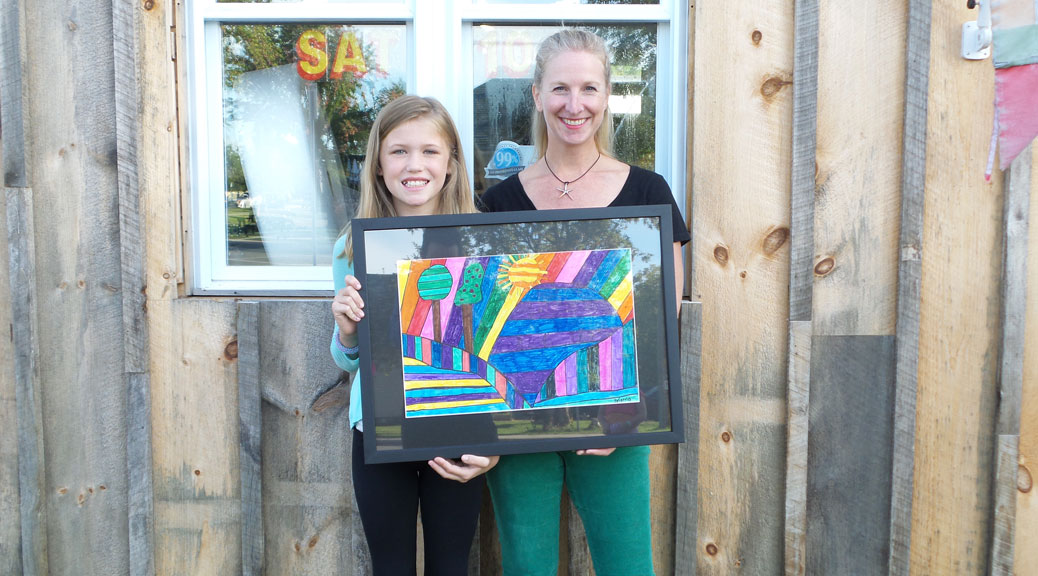 Brianna Richard with Amy Walker from Walkerworks Picture Framing.