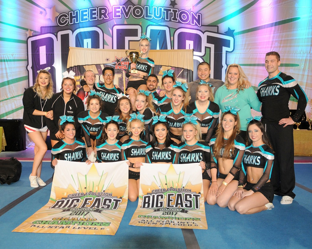 Small Level 6 Co-ed Finback Sharks team with their first place banner and Level 6 Grand Champs banner. Front left to right: Amanda Mullen, Victoria Klassen, Emma Caldwell, Nicola Christie, Lauryn Postma, Rebecca Richardson, Holly Walpole 2nd left to right: Rebecca Snider, Rachel Schneider, Kaitlyn (Pinky) McCaughan, Kaitlyn Morgan, Jordyn Postma. Back left to right: Brooke Mclennan, Taylor Sinclair, Paul Smith, Angelo Chen, Dianna Mcallister, Maurice Semaan, Kaylea Donovan, Kevin Feng, Kelly McCarney, Trevor Schlarb. Photo by Claire McCaughan.