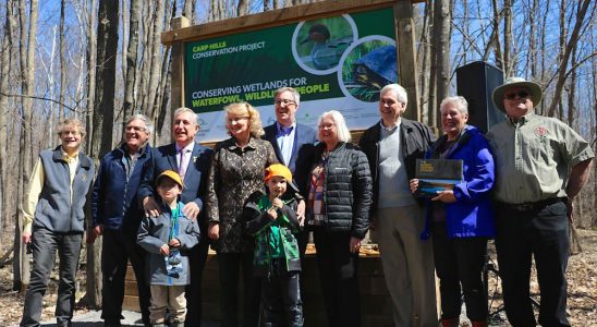 Councillor David Chernushenko, Mark Gloutney (DUC), Councillor El-Chantiry, MP Karen McCrimmon, Mayor Jim Watson, Councillor Marianne Wilkinson, representatives of the Honeywell family (Bill Honeywell, Bette Gordon, and Brady Hand), and two young Carp residents showing off their new DUC caps. Photo courtesy of Janet Mason / Friends of the Carp Hills.