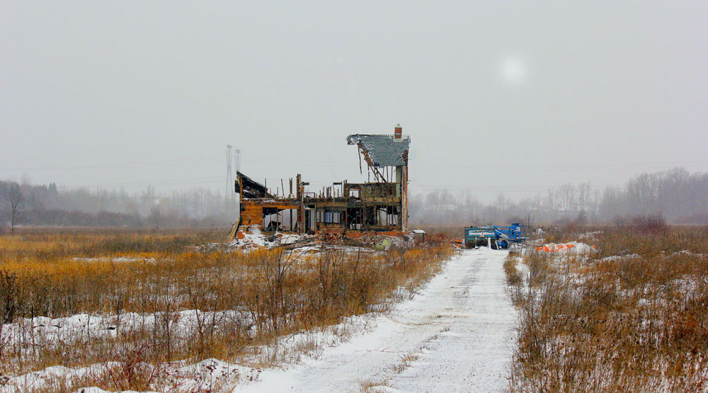 Fernbank Road on November 21 during our first snow storm of the season of an old farm house being demolished to make way for a new development. Photo by Brian Eastop.