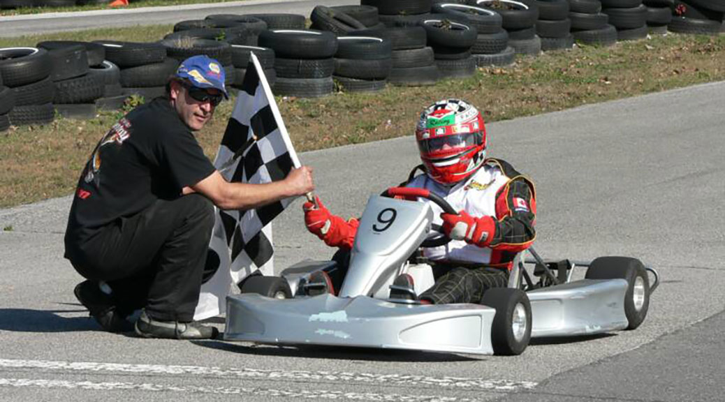 Enrico Valente crosses the finish line at a recent kart racing event.