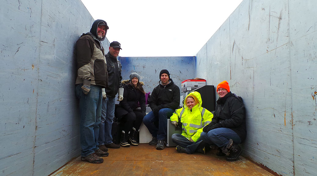 Some very chilly parent volunteers collected e-waste on Saturday morning, as a fundraiser for Stittsville Public School. Photo by Glen Gower.