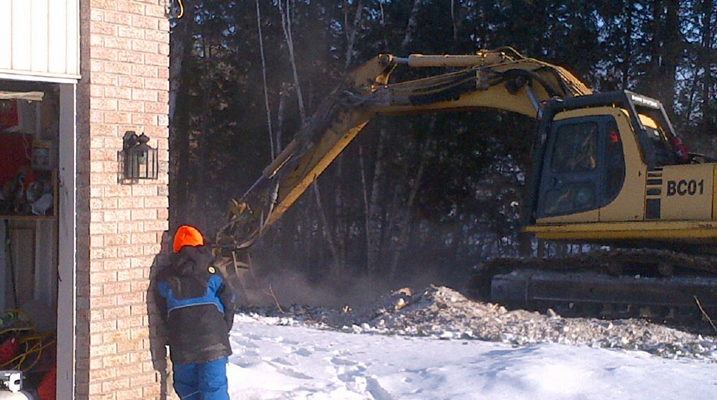 Machines clear trees on Fernbank Road