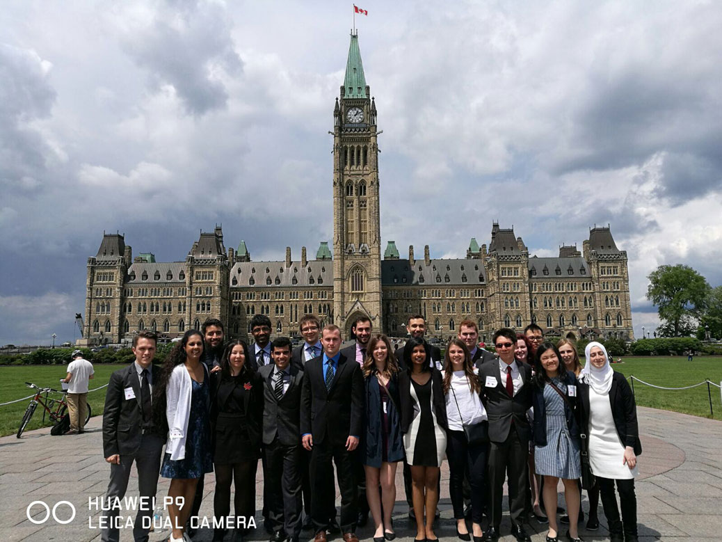The students on Parliament Hill. Rodolphe Brossard, Polytechnique Montreal Sumreen Rattan, SFU Gabriel Soares, SFU Dawn Chandler, SFU Andy Gehlan, U of T Alireza Nickooie, U of T Olivier Carpentier, Polytechnique Montreal Cameron Mulligan, Western Mohammed Amin Shanti, U of Ottawa Allison Sherwin, U of Ottawa Colin Armstrong, U of Waterloo Ann Gunaratnam, Carleton Kyle Bjornson, Carleton Anna Maria Nalepa, Waterloo Tony Ye, U of Toronto Lizzie Adams, U of Saskatchewan Riel Castro-Zunti, U of Saskatchewan Sandryne David, Polytechnique Montreal Serena Chao, UBC Rana Fouad-Khalil, U of Ottawa