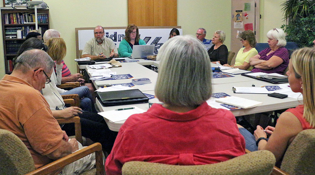 At the Kanata Stittsville Refugee Sponsorship Group meeting, Rev. Grant Dillenbeck answers questions on how to help Syrian refugees. Photo by Shannon Lough.