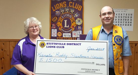 Beth Lewis and Robert Gregory with a donation cheque for $1,500 for the Ruddy-Shenkman Hospice in Kanata. The money was raised through the Lions' Catch the Ace fundraiser last fall.