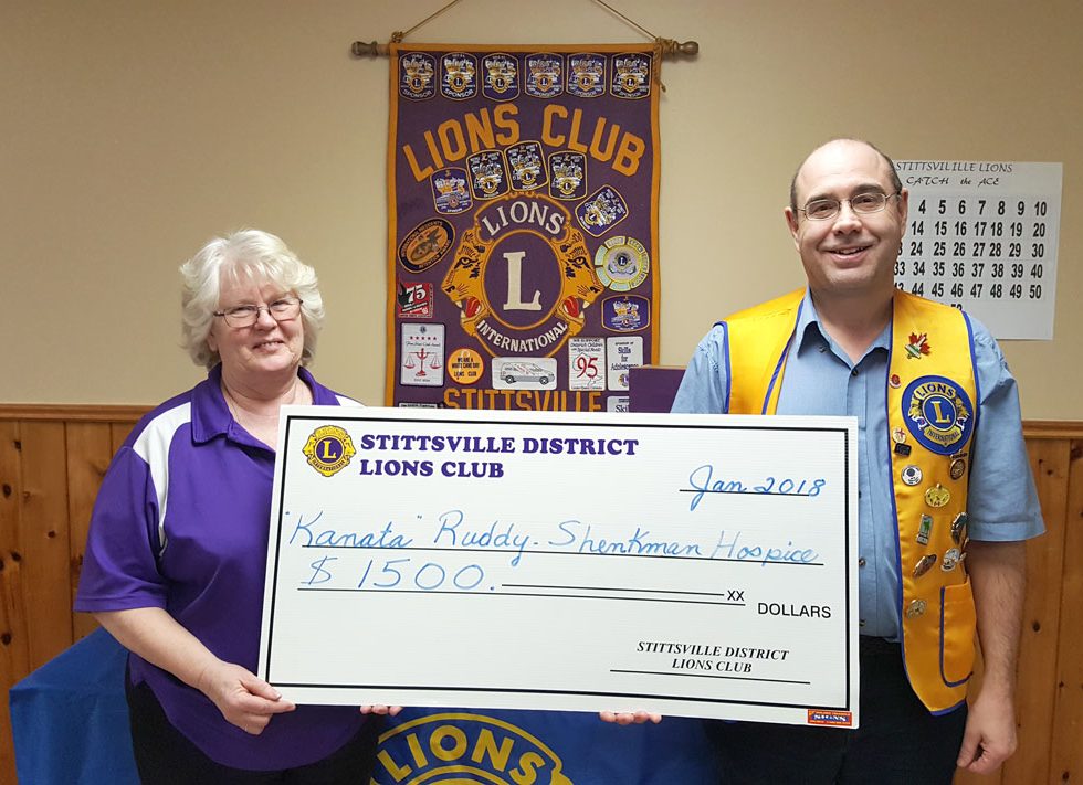 Beth Lewis and Robert Gregory with a donation cheque for $1,500 for the Ruddy-Shenkman Hospice in Kanata. The money was raised through the Lions' Catch the Ace fundraiser last fall.