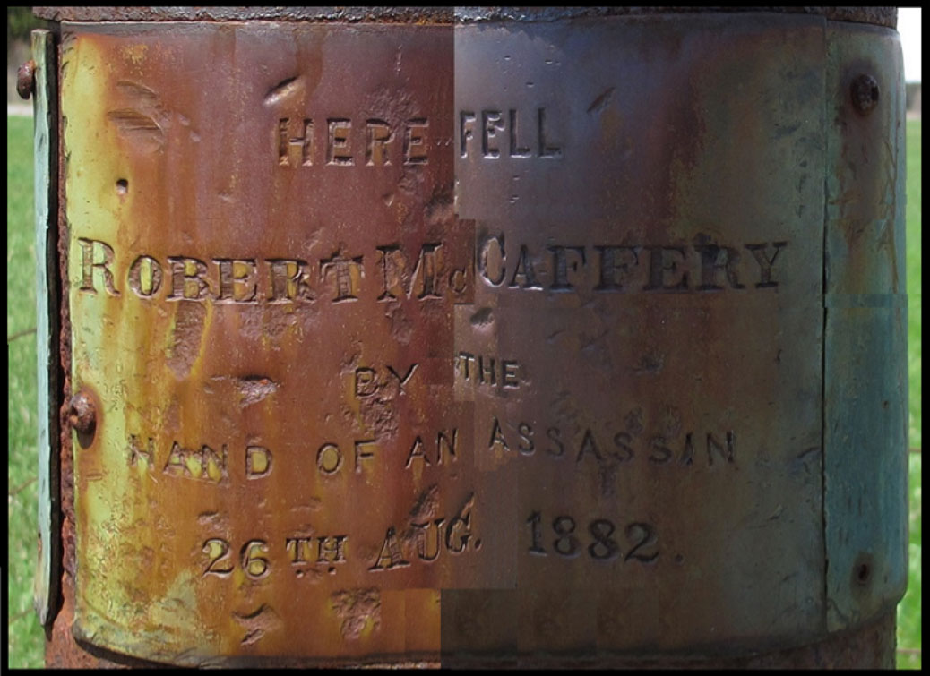 The sign installed on a post at the scene of the murder of Robert McCaffrey.