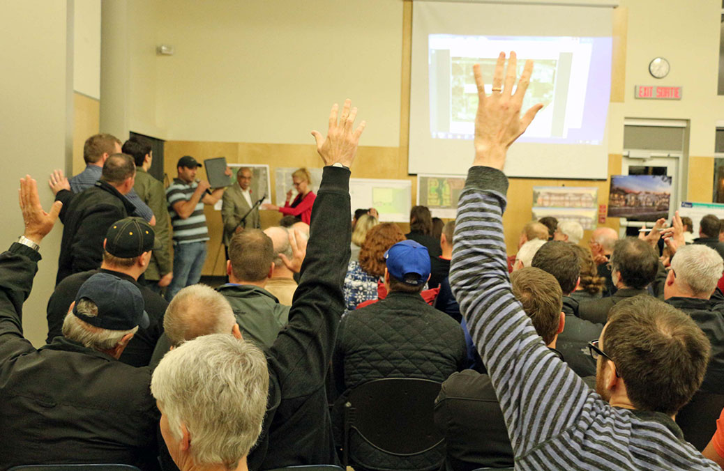 There were approximately 100 people at the public meeting sharing their perspective on the new development and how it will affect their lives. Photo by Shannon Lough.