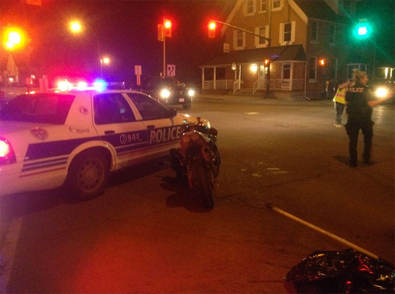 A motorcycle was involved in a collision at Abbott and Stittsville Main on Friday night. Photo by Devyn Barrie.