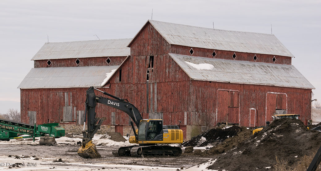 Construction equipment in front of the Bradley-Craig barn. Photo by Dan Pak.
