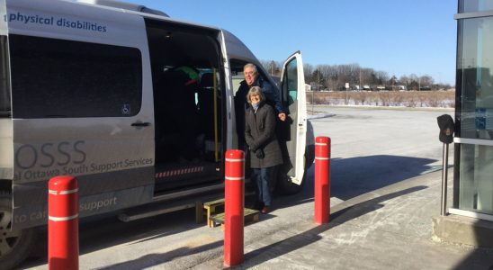 Driver Greg Bungay and volunteer Pamela Brown with the ROSSS Gateway to Groceries bus.