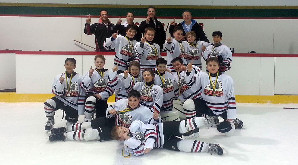 Photo: Front row (lying down) left to right: William MacNeil, Luke Yelle. Second row, left to right: Evan Moo, Tyler Hannah, Cameron Stone, Grady Lowthian, Patrick Bonini, Austin Sykes, Christopher Perron. Third row, left to right: Eric Exley, Sam Booker, Thomas Wainwright, Erik Wilson, Wei-Wei Fan-Saschenbrecker. Back row, left to right: Assistant Coach Marc Hannah, Head Coach Rob Stone, Assistant Coach Mark Wilson, Trainer Frank Wainwright. Missing from photo: Conner Howard.