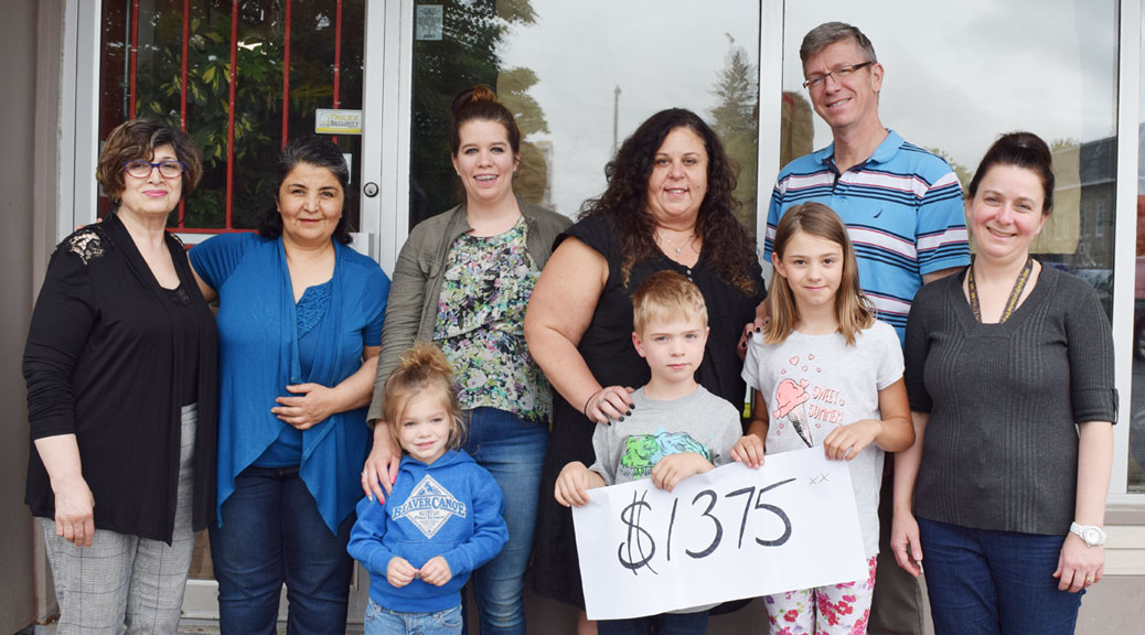 PHOTO: From June 2017, following the Stittsville Childcare Centre's 10th Annual BBQ and Raffle Fundraiser for Cancer Research held at our centre. Each year, for the past 10 years, our staff volunteer their time and offer a family oriented, fun event to raise funds for cancer research through donating all money raised to the Ottawa Hospital in honour of those parents we have lost to cancer as well as those in our community who continue the fight. Photo by John Curry, republished with permission