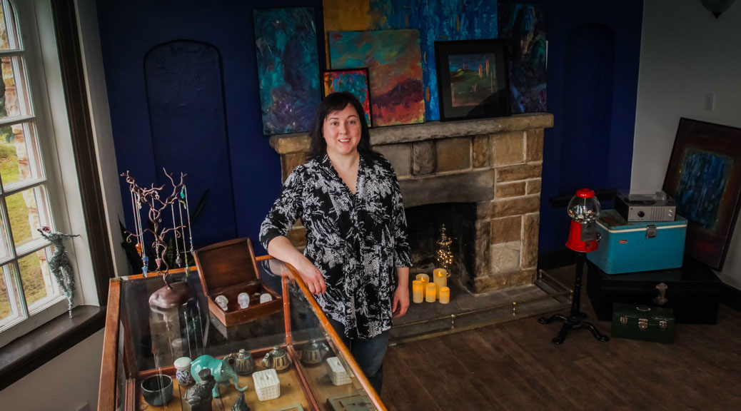 Story Art owner Mel Richer stands in the front from of the old Bell House. The main floor will be a boutique and showcase for local art. Photo by Barry Gray.