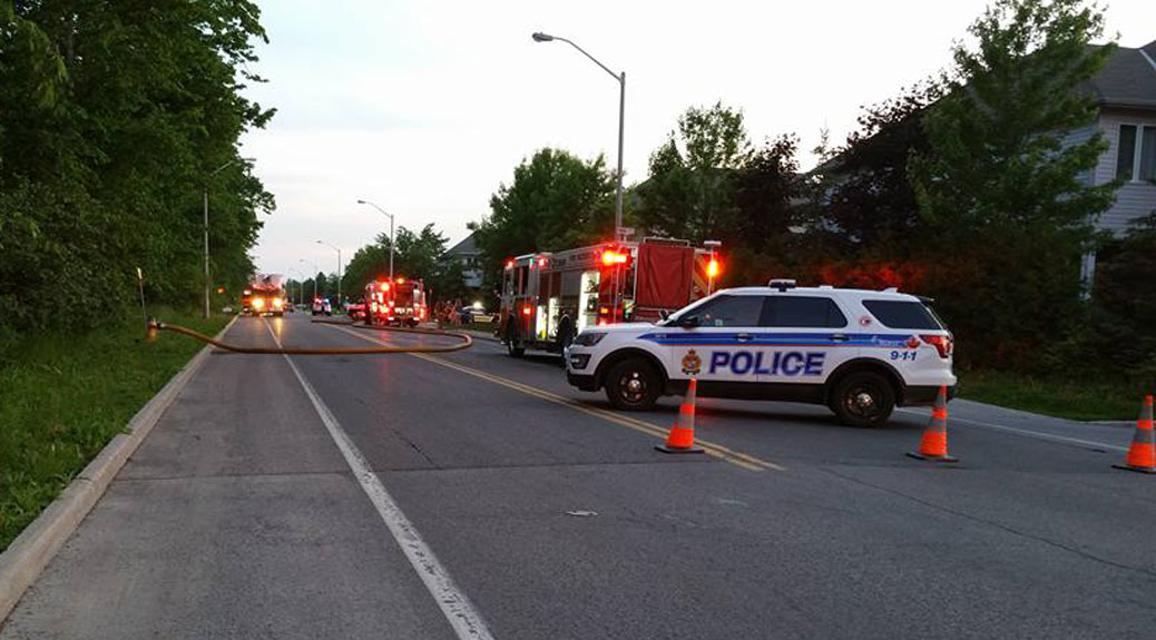 Emergency vehicles respond to a fire on Talltree Crescent on Sunday evening. Photo by Jeffrey Elliott.