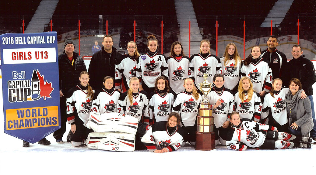 Nepean Wildcats Peewee AA Champions. Front: Cameron Thomas and Hillary Sterling Second Row - Aislyn Blakely, Emma Eryou, Ellie Brown, Gabi Curkovic, Ashley Monds, Caroline Alexander, Elle Spencer, Jamie Aspropotamitis, Dawn Carle (trainer) Back Row - Jamie Monds (asst coach), Eliot Spencer (head coach), Meg Redmond, Delaney Johnston, Amy Hradecky, Mackenzie Audet, Jackie Kuhn, Peyton Carle, Justin Thomas (asst coach) and Ian Sterling (asst coach)